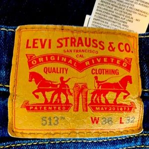 Size 36” waist and  32” inseam Levi’s 513 Blue Jeans
